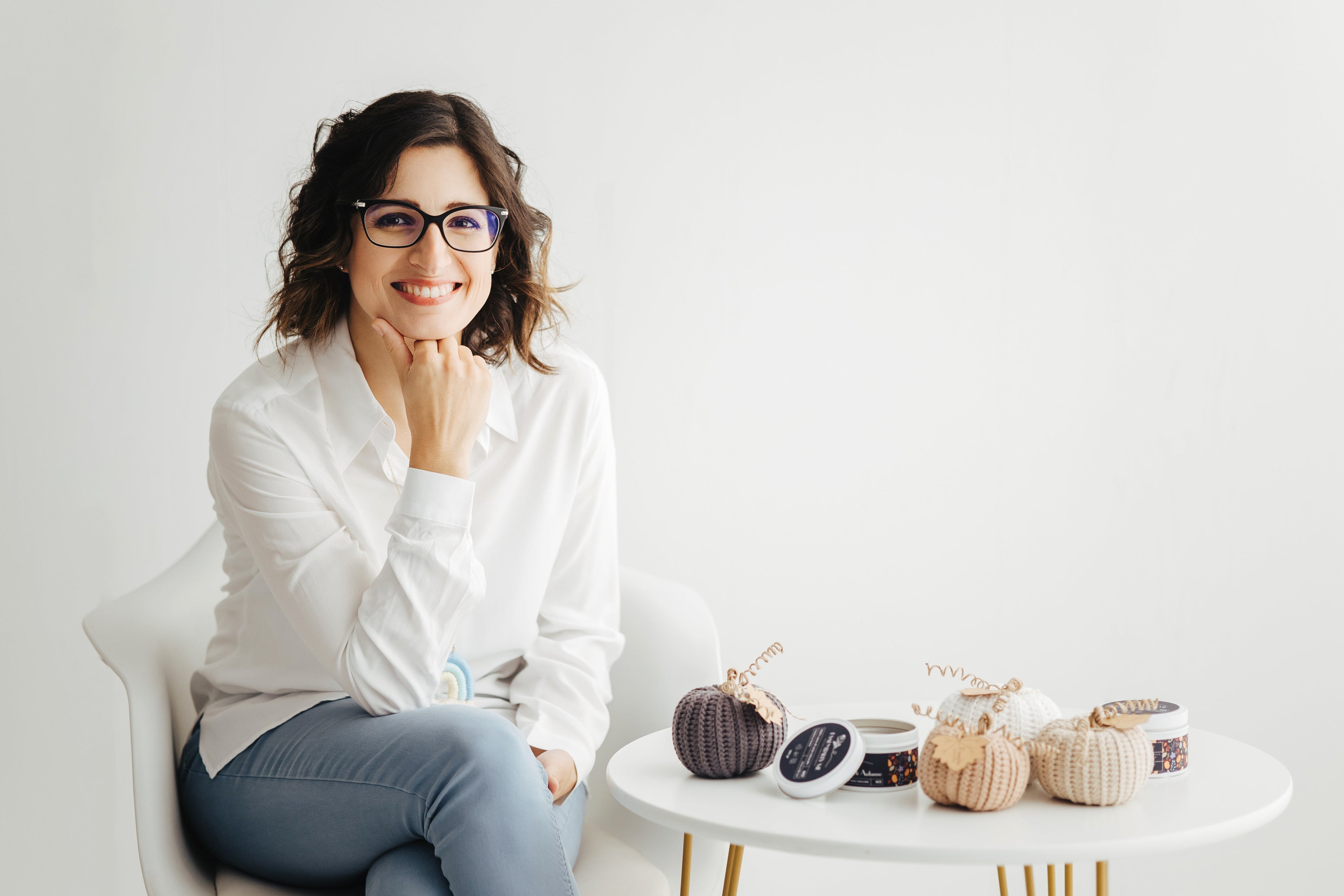 Clementina con le sue zucchette e candele profumo di autunno